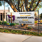 Outdoor church banner in an outdoor setting